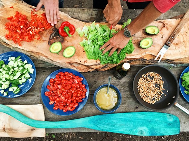 Table with Mexican food in bowls